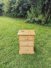 Load image into Gallery viewer, English pine three drawer bedside cabinet