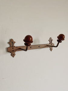 Vintage French painted metal and wood coat hooks