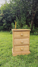 Load image into Gallery viewer, English pine three drawer bedside cabinet