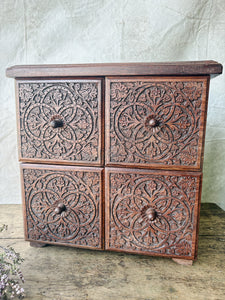 Handmade rosewood carved table top chest of drawers