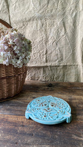 Vintage cast iron enamelled trivet