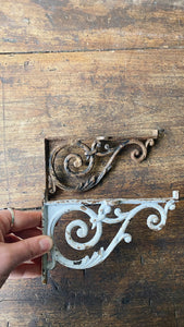 Vintage French medium cast iron shelf brackets