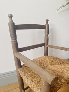 Vintage straw seat child’s armchair