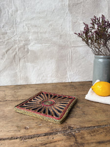 Vintage 1970s straw trivet