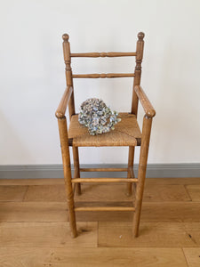 Vintage French high chair in oak and straw seat