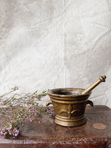 Antique bronze “Fleur de Lys” pestle and mortar