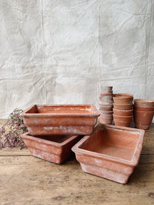 Weathered small terracotta planters
