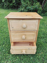 Load image into Gallery viewer, English pine three drawer bedside cabinet