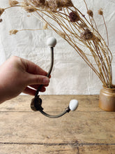 Load image into Gallery viewer, Antique Brass and porcelain hat and coat hook
