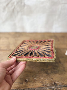 Vintage 1970s straw trivet