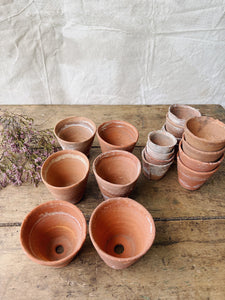 Antique hand thrown terracotta seedling pots