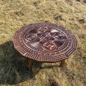 Carved hardwood coffee table