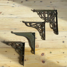Load image into Gallery viewer, Antique cast iron brackets